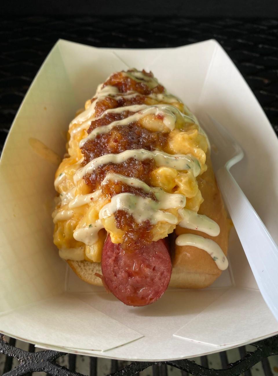 Food Fire and Ferment’s Big Beefy Boy — a ¼-pound smoked beef sausage topped with mac and cheese, beer bacon jam and chipotle ranch.