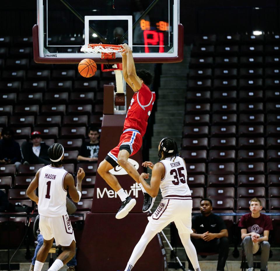 Bradley Braves Darius Hannah dunks the ball on the Missouri State Bears during BU's 86-62 win at Great Southern Bank Arena on Wednesday, Feb. 21, 2024.