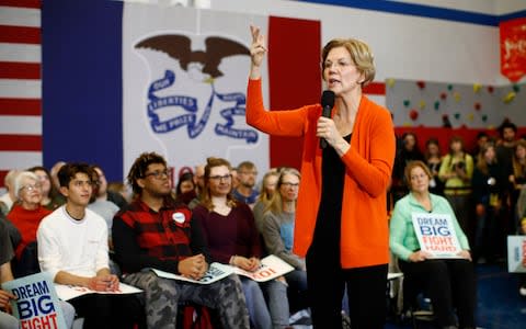 Elizabeth Warren confirmed a report that said Bernie Sanders said a woman could not win the vote - Credit: AP Photo/Patrick Semansky)