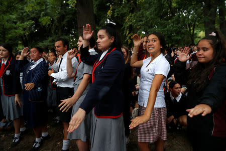 Students perform the Haka as they gather in a vigil to commemorate victims of Friday's shooting, outside Masjid Al Noor mosque in Christchurch, New Zealand March 18, 2019. REUTERS/Jorge Silva