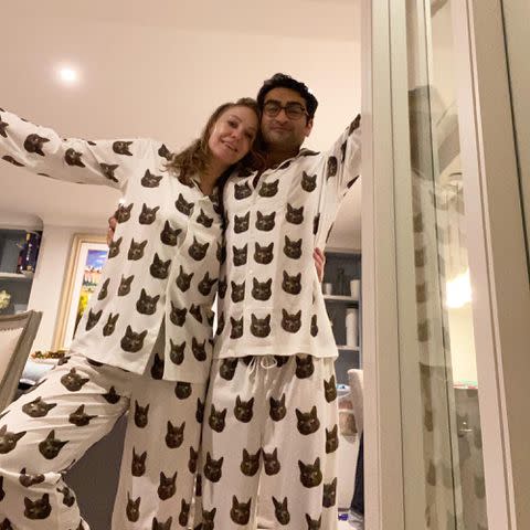 <p>Emily V. Gordon Instagram</p> Kumail Nanjiani and his wife, Emily V. Gordon, in cat pjs.