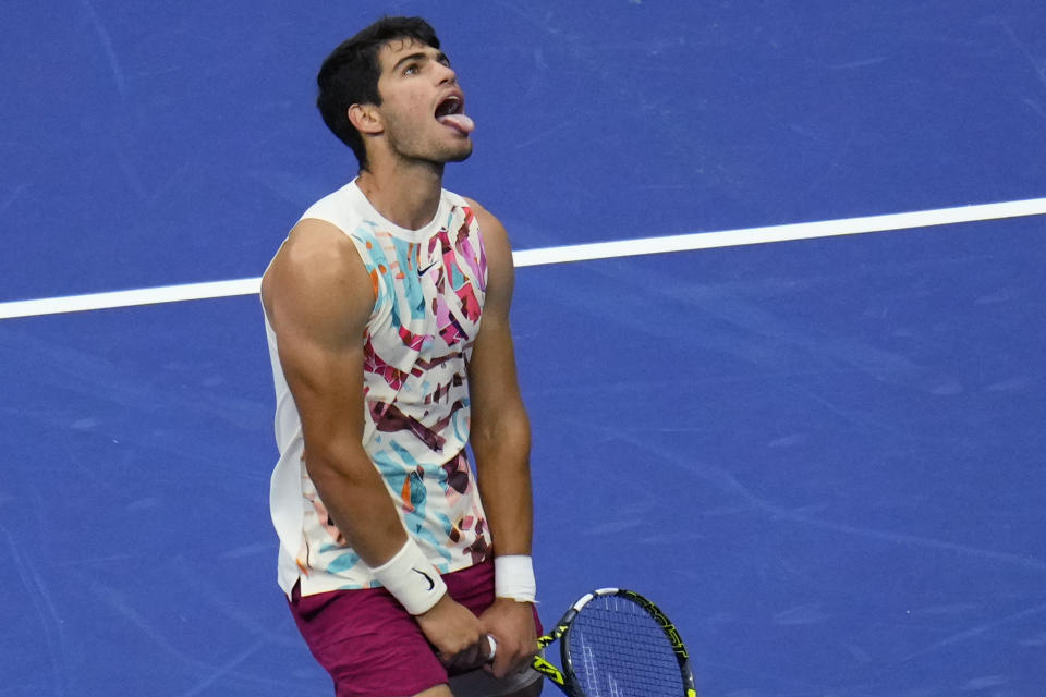 Carlos Alcaraz, of Spain, reacts during his match against Matteo Arnaldi, of Italy, during the fourth round of the U.S. Open tennis championships, Monday, Sept. 4, 2023, in New York. (AP Photo/Manu Fernandez)