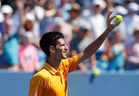 Aug 22, 2015; Cincinnati, OH, USA; Novak Djokovic (SRB) acknowledges fans after defeating Alexandr Dolgopolov (not pictured) in the semifinals during the Western and Southern Open tennis tournament at the Linder Family Tennis Center. Mandatory Credit: Aaron Doster-USA TODAY Sports