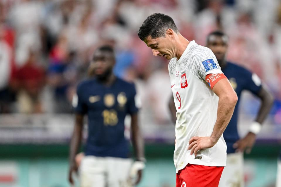 DOHA, QATAR - DECEMBER 04: Robert Lewandowski of Poland looks dejected during the FIFA World Cup Qatar 2022 Round of 16 match between France and Poland at Al Thumama Stadium on December 4, 2022 in Doha, Qatar. (Photo by Harry Langer/DeFodi Images via Getty Images)