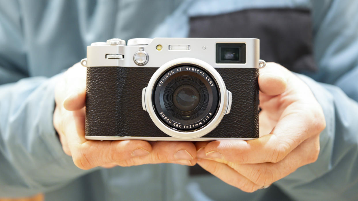  Fujifilm X100VI in the hand. 