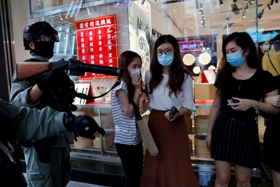 Hong Kong protests guns.JPG