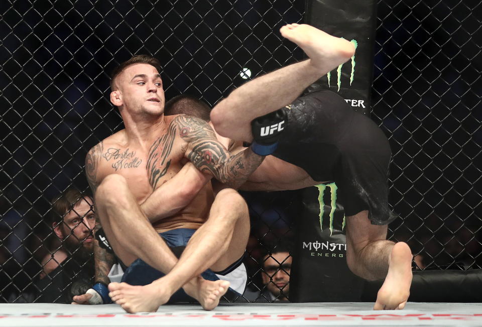 ABU DHABI, UNITED ARAB EMIRATES  SEPTEMBER 7, 2019: UFC lightweight champion Khabib Nurmagomedov and interim UFC lightweight champion Dustin Poirier fight in their title unification bout at the UFC 242 mixed martial arts tournament. Valery Sharifulin/TASS (Photo by Valery Sharifulin\TASS via Getty Images)