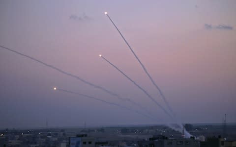 A number of rockets were launched from the Gaza Strip toward Israel following the shootout in the strip - Credit: SAID KHATIB/ AFP