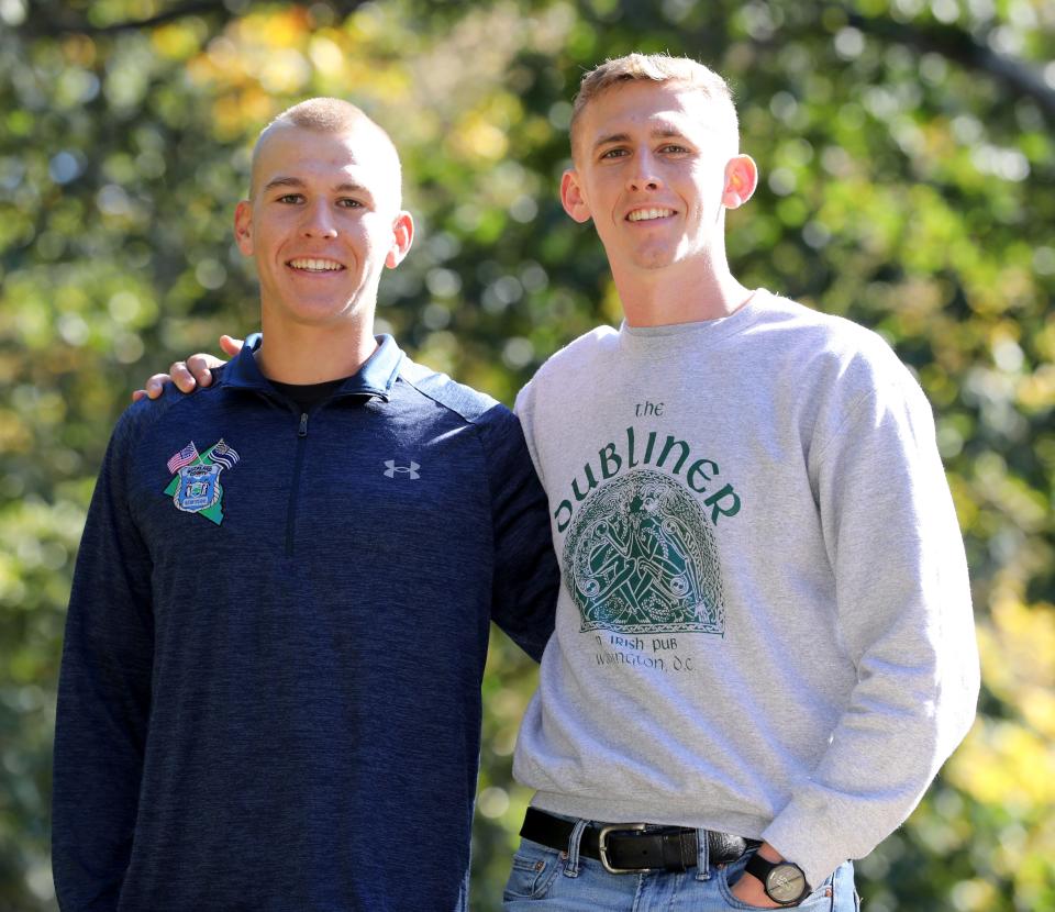 Johnny Costello, left, who just finished U.S. Marine Corps basic training, with his brother, Danny Costello Jr., a 2nd lieutenant in the U.S. Marine Corps, at their home in Pearl River, Oct. 13, 2023. Their other brother, James, was just promoted to corporal in the Marines.
