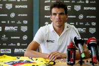 Cycling - Tour de France - Rest day - Aix-les-Bains, France, July 16, 2018. BMC Racing Team rider Greg Van Avermaet of Belgium looks at his yellow jersey during the press conference. REUTERS/Emmanuel Foudrot
