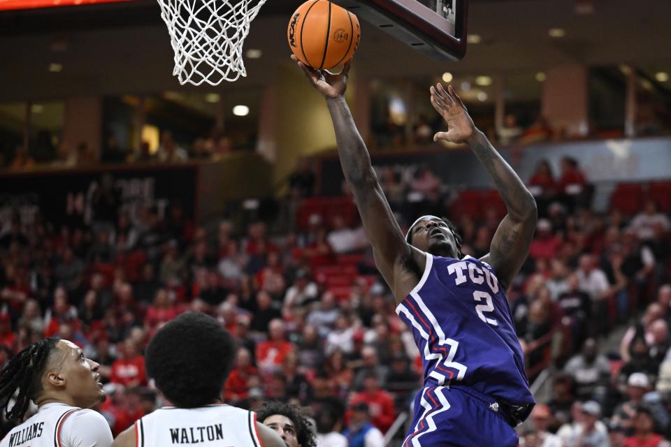 TCU forward Emanuel Miller (2) shoots against Texas Tech during the second half of an NCAA college basketball game Tuesday, Feb. 20, 2024, in Lubbock, Texas. (AP Photo/Justin Rex)