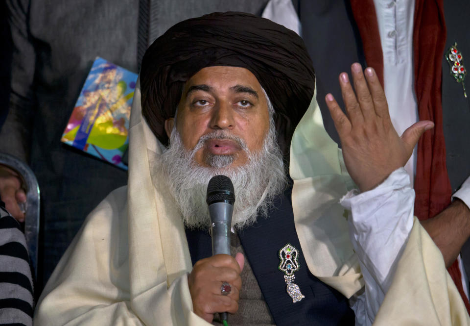 FILE - In this Nov. 26, 2017 file photo, Khadim Hussein Rizvi, head of 'Tehreek-e-Labaik Pakistan, a religious political party, speaks during a press conference in Islamabad, Pakistan. Rizvi, a radical religious cleric, who led tens of thousands in anti-France around the country, died Thursday, Nov. 19, 2020. His spokesman and a doctor at the hospital where Rizvi died said he was suffering from COVID-like symptoms but was not tested for the virus. (AP Photo/Anjum Naveed, File)