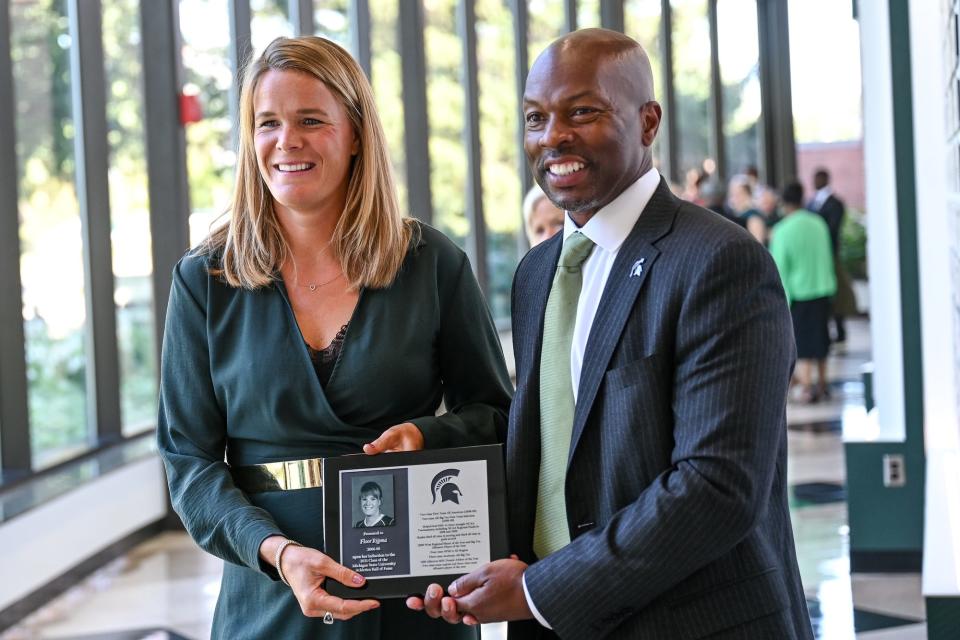 Michigan State University's 2021 Hall of Fame inductee Floor Rijpma, women's field hockey, left, poses with MSU Athletic Director Alan Haller during this year's ceremony on Friday, Sept. 9, 2022, at the Clara Bell Smith Center on the MSU campus in East Lansing. Rijpma was unable to make last year's ceremony due to the pandemic.