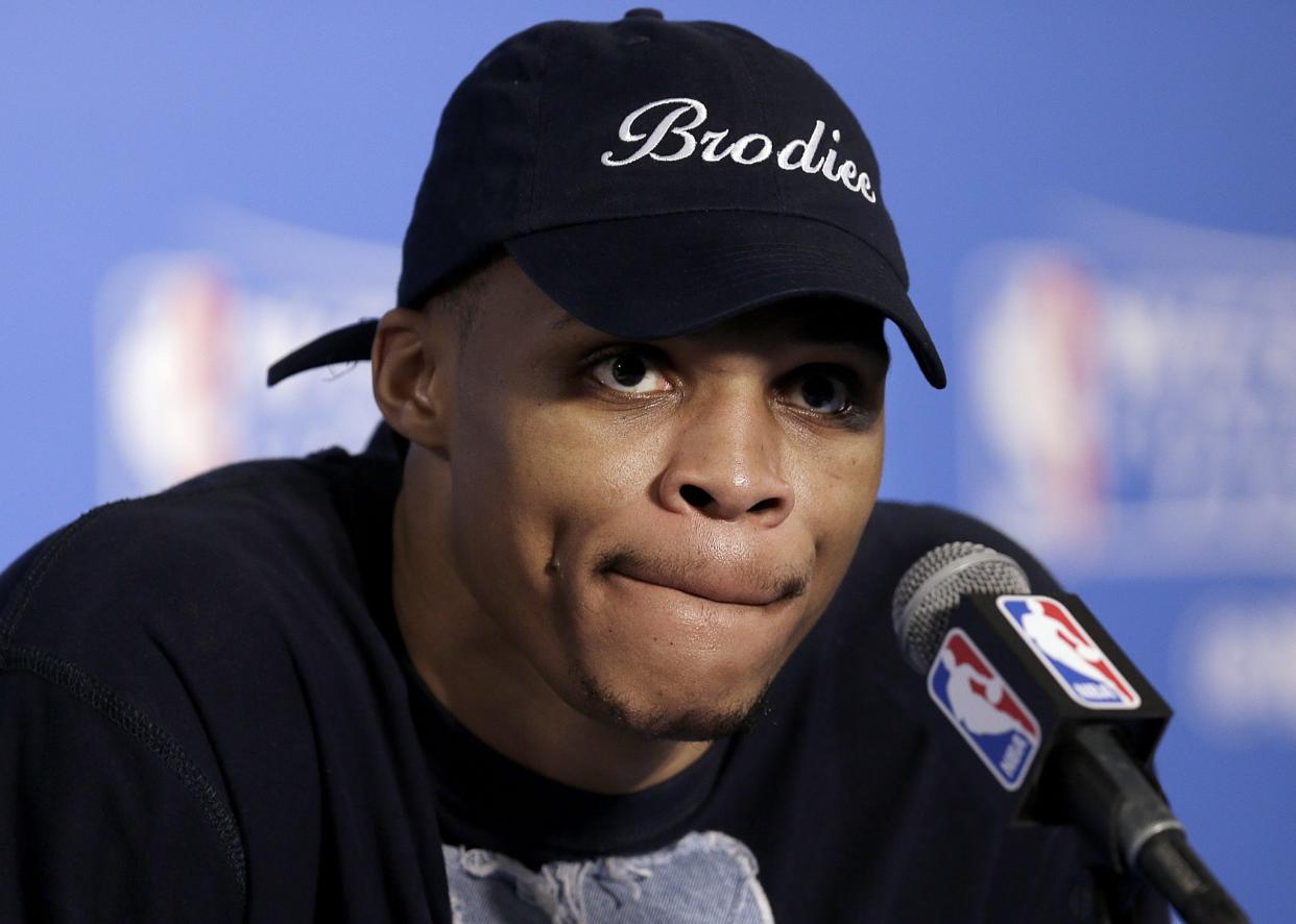 Nice try, but Russell Westbrook's lips remain sealed. (AP/Ben Margot)
