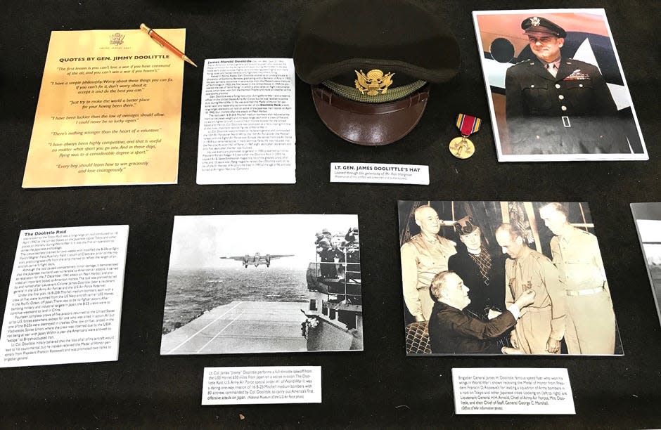 An exhibit about the Doolittle Raiders at the Crestview Public Library includes then Lt. Gen. James Doolittle’s cap and World War II artifacts on loan from local collectors. The exhibit will be open through April.