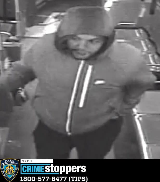 Police released this surveillance photo of one of the two suspects sought in a Feb. 18 Bronx knifepoint robbery. DCPI