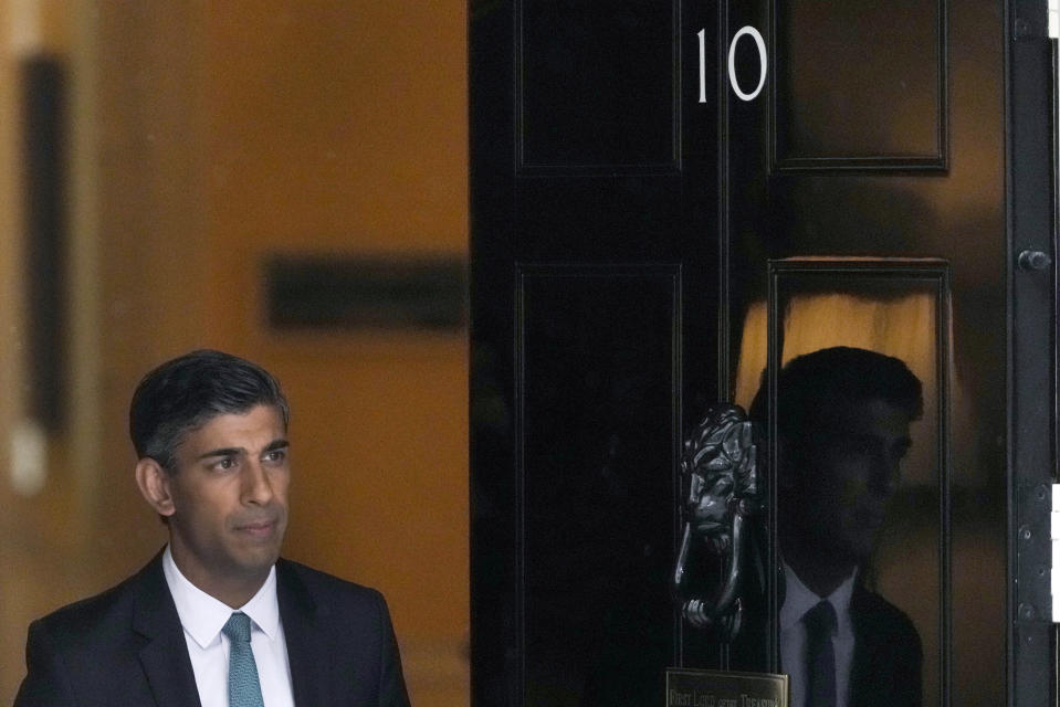 Britain's Prime Minister Rishi Sunak leaves 10 Downing Street for the House of Commons for his first Prime Minister's Questions in London, Wednesday, Oct. 26, 2022. Sunak was elected by the ruling Conservative party to replace Liz Truss who resigned. (AP Photo/Frank Augstein)