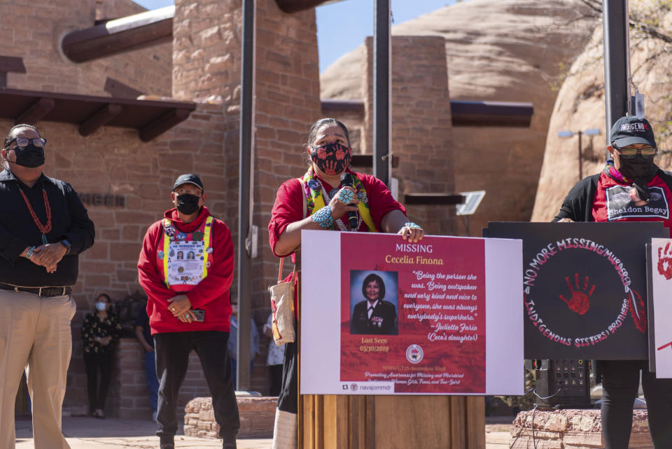 In this image provided by the Navajo Nation Office of the Speaker, Navajo Nation Council Delegate Amber Kanazbah Crotty, center, addresses a crowd gathered, Wednesday, May 5, 2021, in Window Rock, Ariz., during an event to commemorate a day of awareness for the crisis of violence against Indigenous women and children. (Byron C. Shorty, Navajo Nation Office of the Speaker via AP)