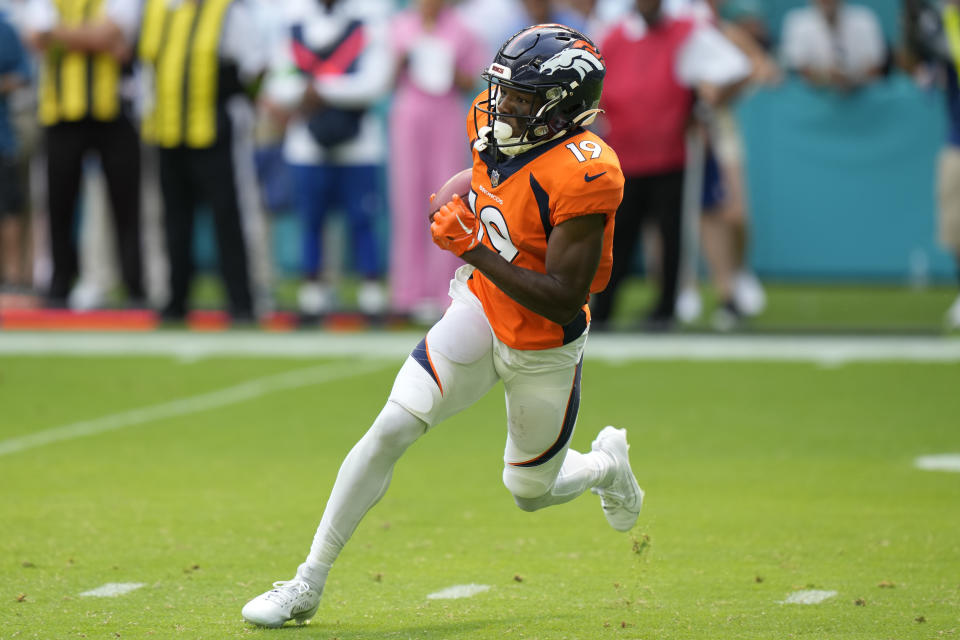 Denver Broncos wide receiver Marvin Mims Jr. (19) run the ball during the second half of an NFL football game against the Miami Dolphins, Sunday, Sept. 24, 2023, in Miami Gardens, Fla. (AP Photo/Wilfredo Lee)