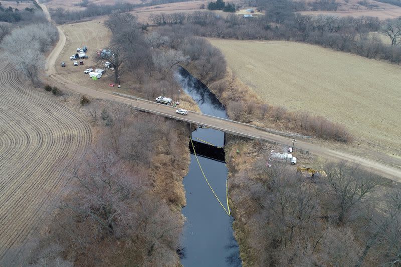 FILE PHOTO: Investigators, cleanup crews begin scouring oil pipeline spill in Kansas