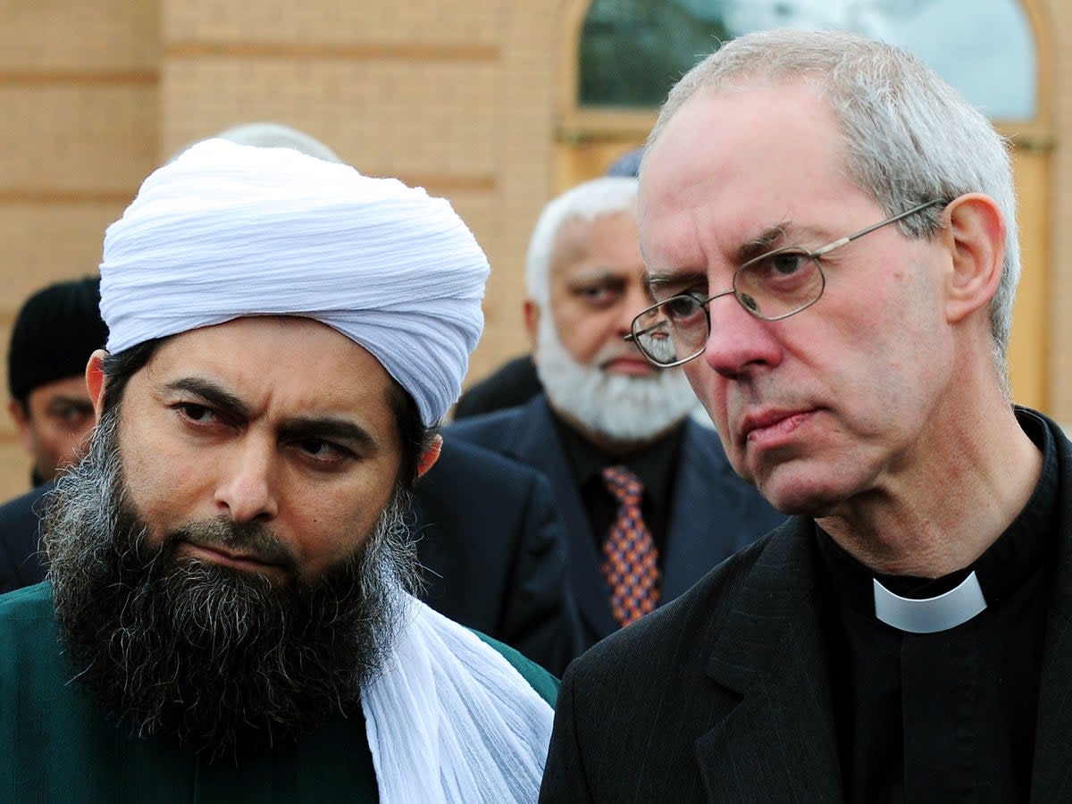 Senior imam Ibrahim Mogra alongside the Archbishop of Canterbury, Justin Welby (PA)