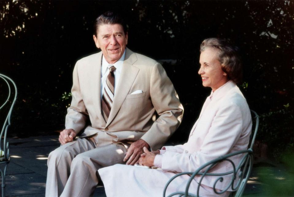 PHOTO: President Ronald Reagan sits with his nominee for Supreme Court Justice, Sandra Day O'Connor, outside the Oval Office of the White House in Washington, July 15, 1981. (Corbis via Getty Images, FILE)