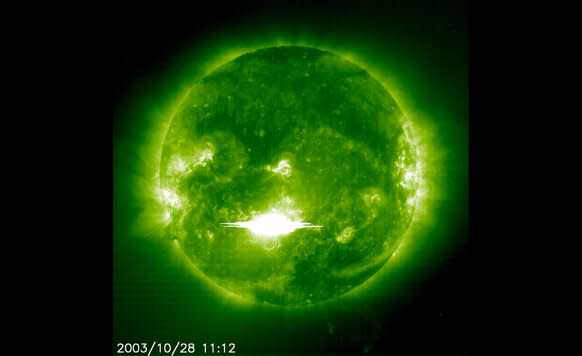 A huge solar flare erupted on the Sun in October 2003, seen here in X-rays. It was also accompanied by a powerful coronal mass ejection. Solar storms like these are a danger to our power grid and orbiting satellites. Credit: NASA/SOHO