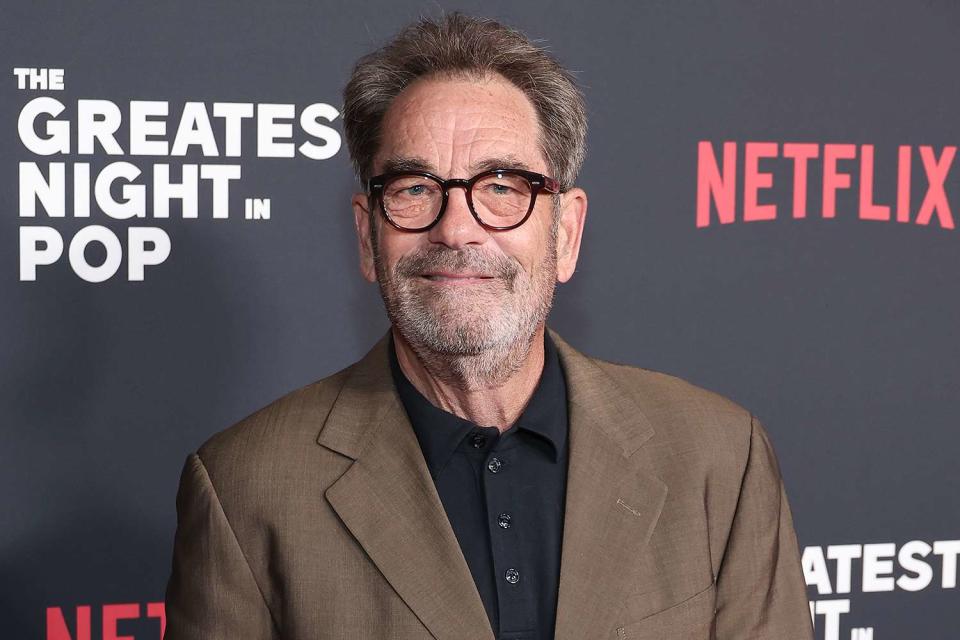 <p>Leon Bennett/Getty Images</p> Huey Lewis at the premiere of Netflix