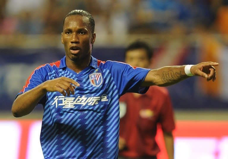 Ivorian striker Didier Drogba playing for Shanghai Shenhua FC in their game against Hangzhou Greentown in Shanghai Hongkou Stadium on August 4, 2012. Ivory Coast is in a strong position to capture the CAF Footballer of the Year award on Thursday, with two of its stars, Drogba and Yaya Toure, nominated against an up-and-coming midfielder from Cameroon