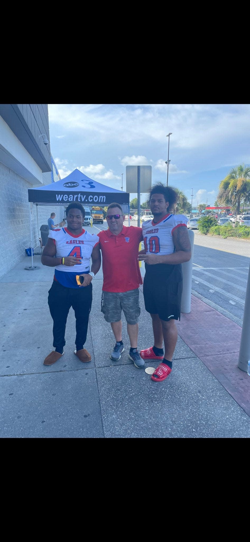 Pine Forest's Elijah Douglas and Kobe Johnson gave back to the community in participating with United Way's "Stuff the Bus."