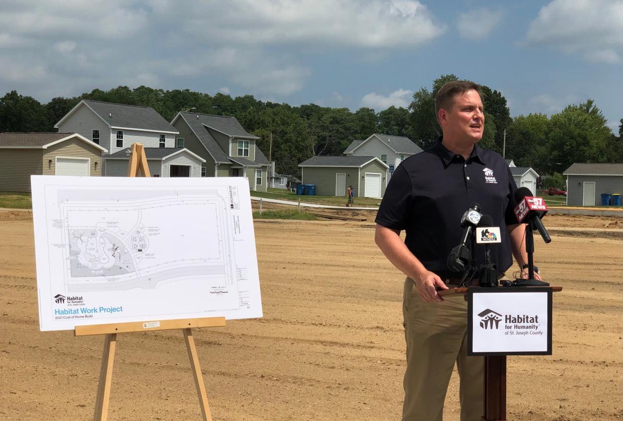 Jim Williams, president and CEO of Habitat for Humanity of St. Joseph County, talks in 2021 about an upcoming house build project at the Fields of Highland in Mishawaka at the site where a park will be installed. The project will consist of the construction of six new houses.