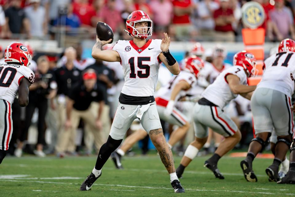 Georgia quarterback Carson Beck (15) throws the ball during the second half his team’s 2023 game against Florida at Everbank Stadium in Jacksonville, Fla. Credit: Matt Pendleton-USA TODAY NETWORK