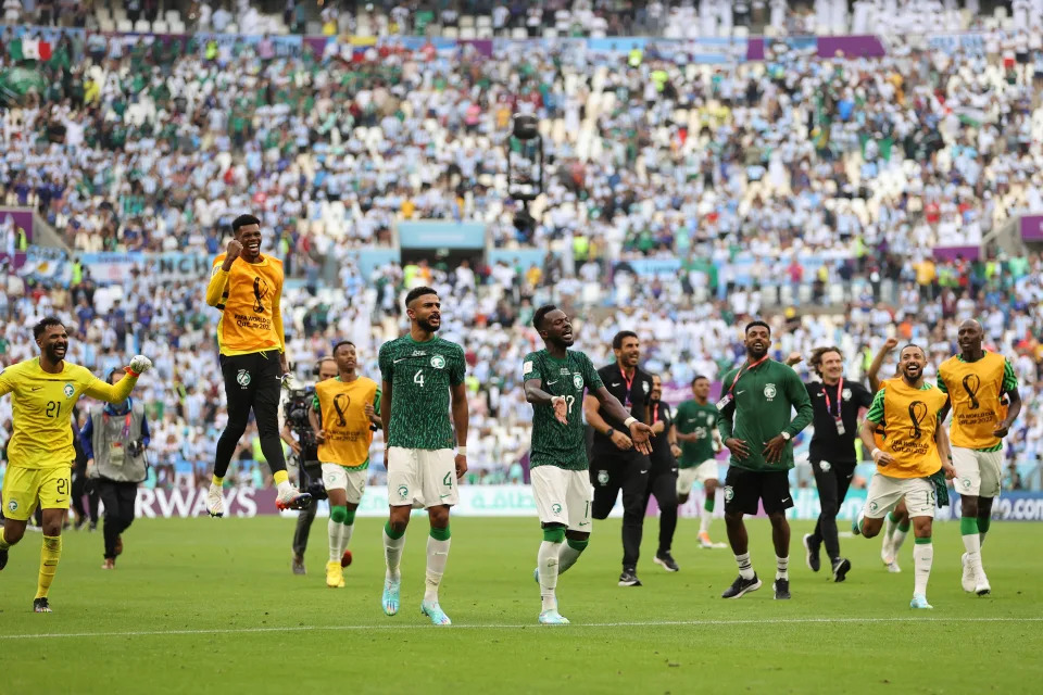 LUSAIL CITY, QATAR - NOVEMBER 22: Saudi Arabia players celebrate the 2-1 win during the FIFA World Cup Qatar 2022 Group C match between Argentina and Saudi Arabia at Lusail Stadium on November 22, 2022 in Lusail City, Qatar. (Photo by Clive Brunskill/Getty Images)