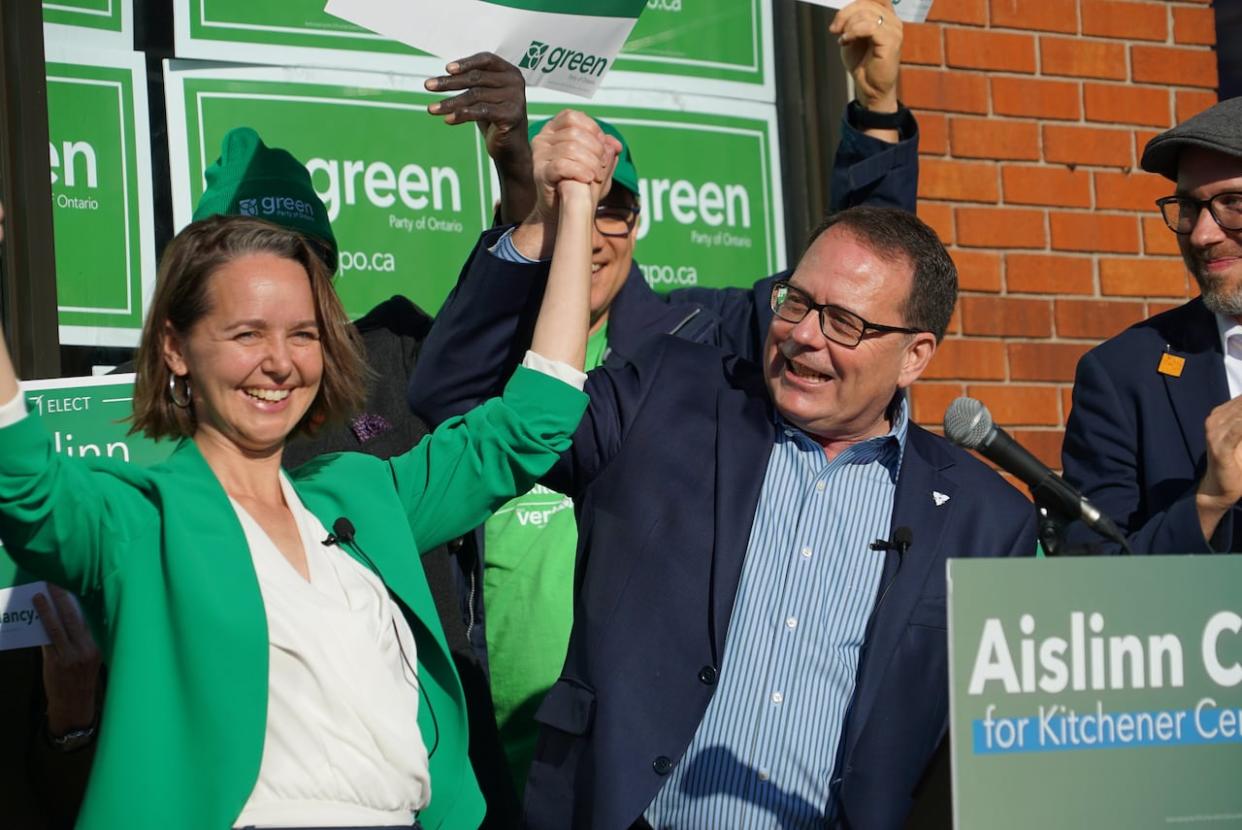 Unofficial results showed Green candidate Aislinn Clancy won the Kitchener Centre byelection Thursday evening. She's seen here on Nov. 13 during a campaign event with Green Party of Ontario Leader Mike Schreiner. (Carmen Groleau/CBC - image credit)