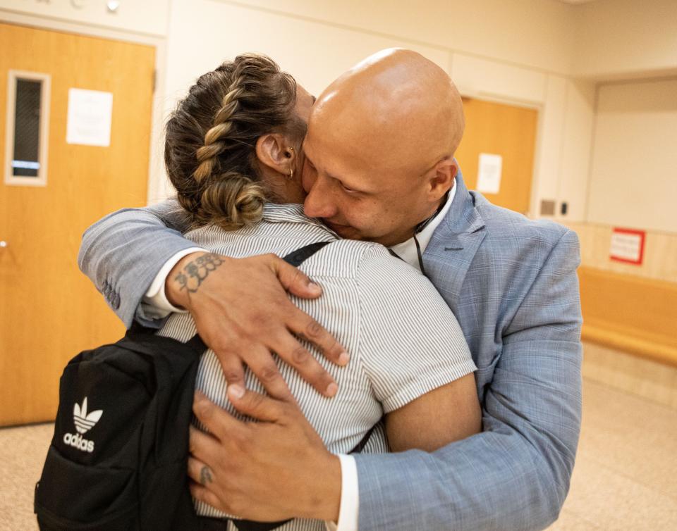 Hector Santiago hugs his partner Madeline Ortiz after he was found not guilty of disorderly conduct in White Plains City Court July 25, 2023. Santiago was charged with several crimes after he was removed from a Yonkers City Council meeting in November 2022. The most serious charges, including assaulting a police officer, were eventually abandoned and he was only tried on the disorderly conduct charge. The trial took place in White Plains City Court after several Yonkers City Court judges recused themselves.