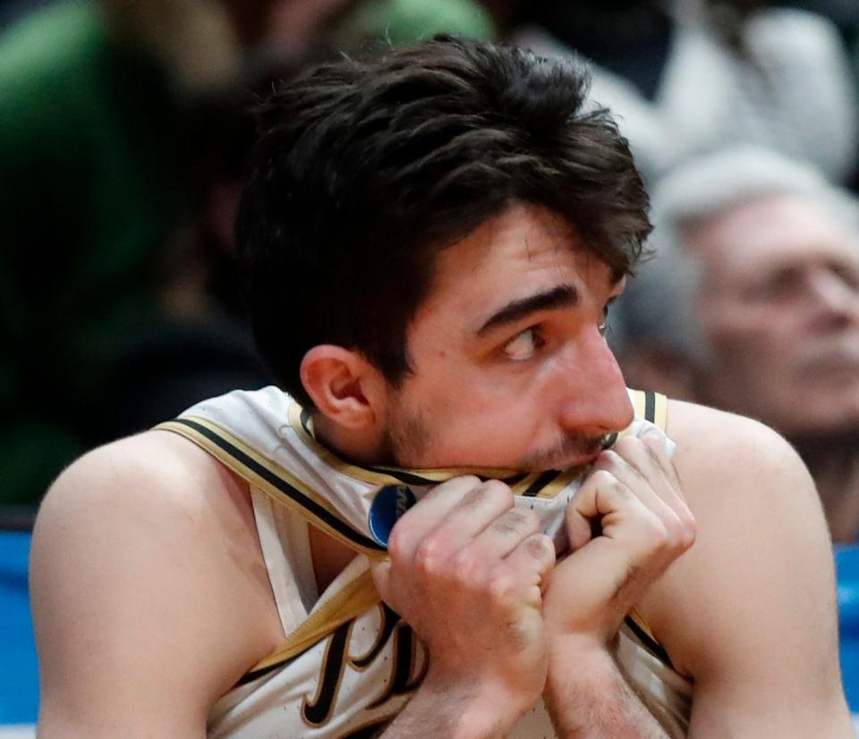 Purdue Boilermakers guard Ethan Morton (25) bites down on his jersey during the NCAA MenÕs Basketball Tournament game against the Fairleigh Dickinson Knights, Friday, March 17, 2023, at Nationwide Arena in Columbus, Ohio. Fairleigh Dickinson Knights won 63-58.