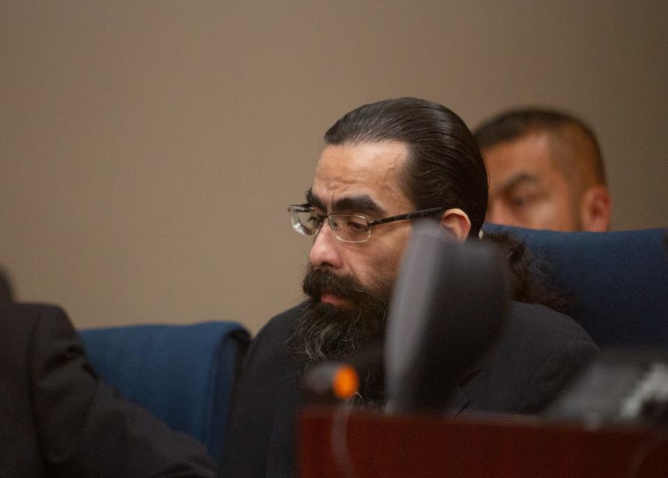 Jospeh Angel Alvarez sits next to his two lawyers on Oct. 16, 2023 as he is accused of fatally shooting El Paso lawyer Georgette G. Kaufmann