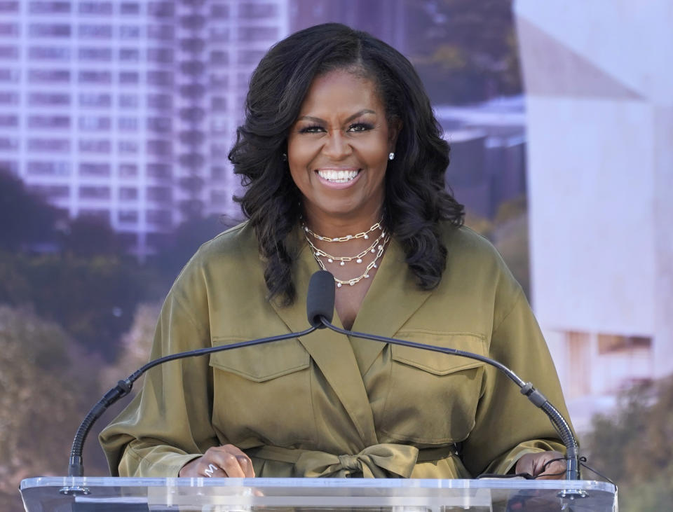 FILE - Former first lady Michelle Obamad smiles as she speaks during a groundbreaking ceremony for the Obama Presidential Center in Chicago on Sept. 28, 2021. Obama will narrate a new digital audio edition of Maurice Sendak’s children's book ""Where the Wild Things Are." HarperCollins Publishers announced Tuesday that the audio download will go on sale Oct. 31, the 60th anniversary of the book’s original release. (AP Photo/Charles Rex Arbogast, File)