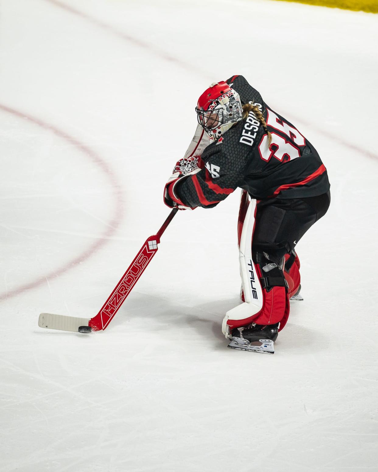 Canada goalie Ann-Renee Desbiens passes the puck against Czechia at the Adirondack Bank Center in Utica.