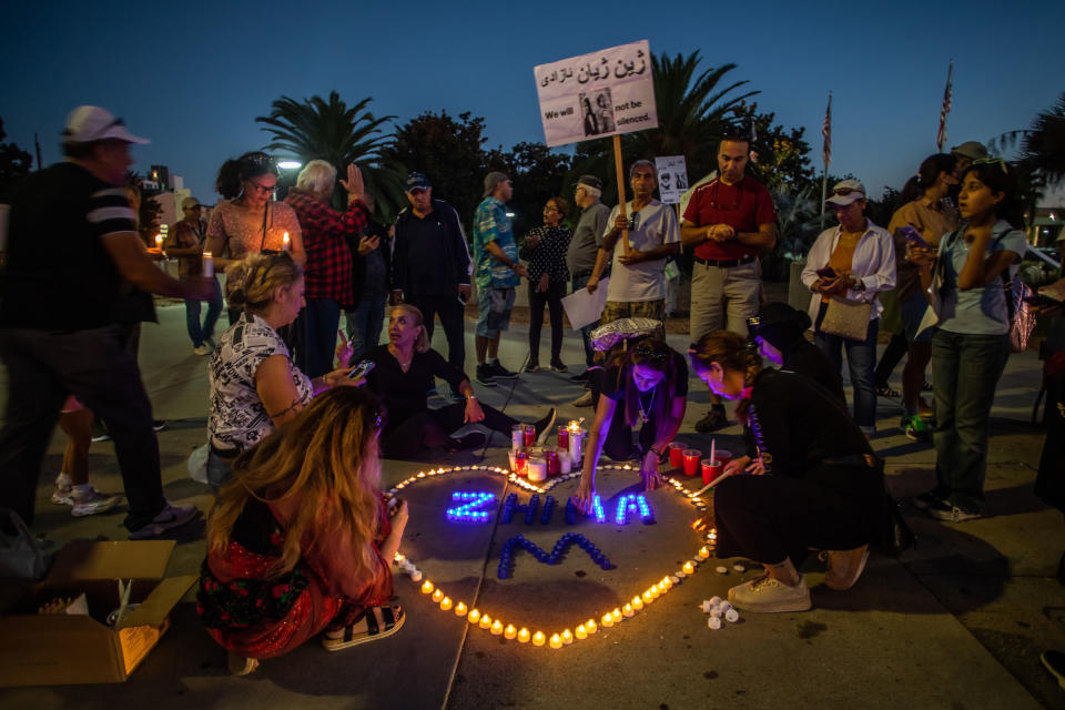 <b>Los Angeles, California </b>Californian Kurds hold a demonstration and candlelight vigil to honor the memory of Mahsa Zhina Amini in front of the Federal Building on Sept. 22, 2022 in Los Angeles.<span class="copyright">Apu Gomes—Getty Images</span>