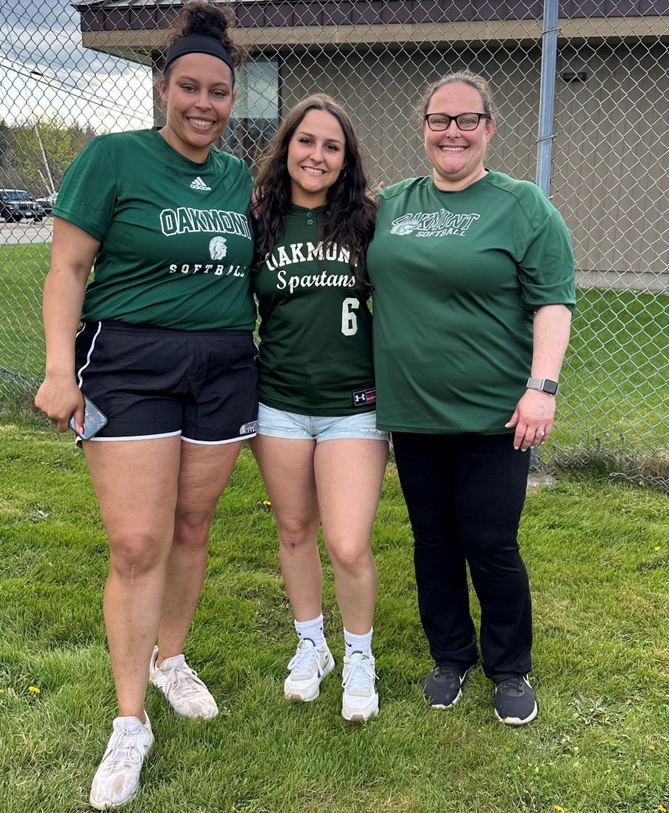 Oakmont softball coach Katrina Bunting (right) alongside her daughters Rachel Sinclair and Sophie Gaidanowicz, who assistant coach and play on the team, respectively.