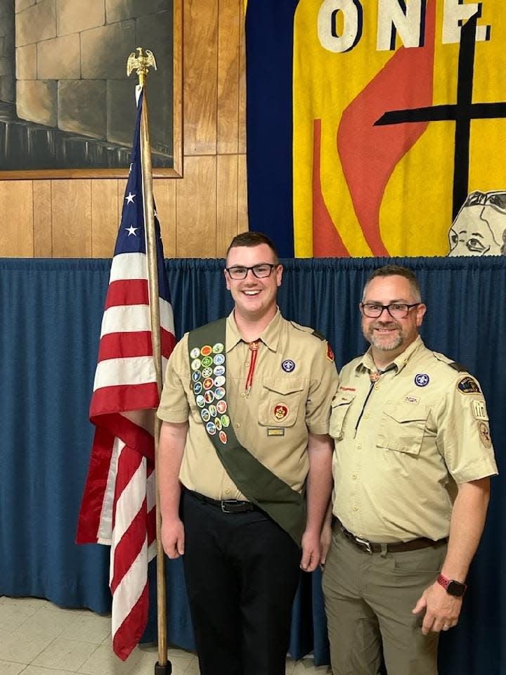 Evan Beard, left, pictured with his father, David Beard, was one of four local scouts named Eagle Scouts recently and the third generation in his family to do so. He built adaptive picnic tables for students in the Maine-Endwell Central School District.