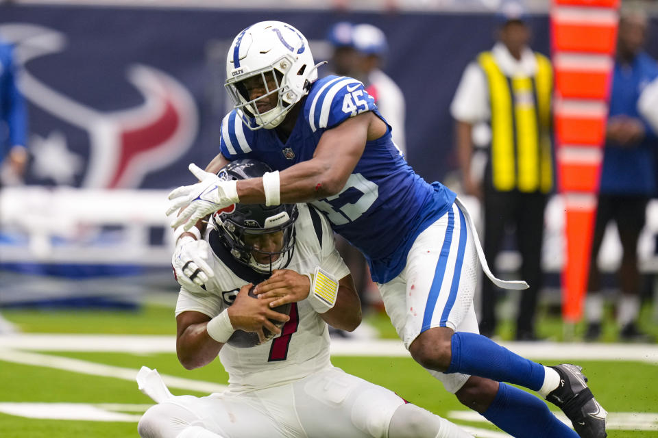 Indianapolis Colts linebacker E.J. Speed (45) sacks Houston Texans quarterback C.J. Stroud (7) in the first half of an NFL football game in Houston, Sunday, Sept. 17, 2023. (AP Photo/Eric Christian Smith)