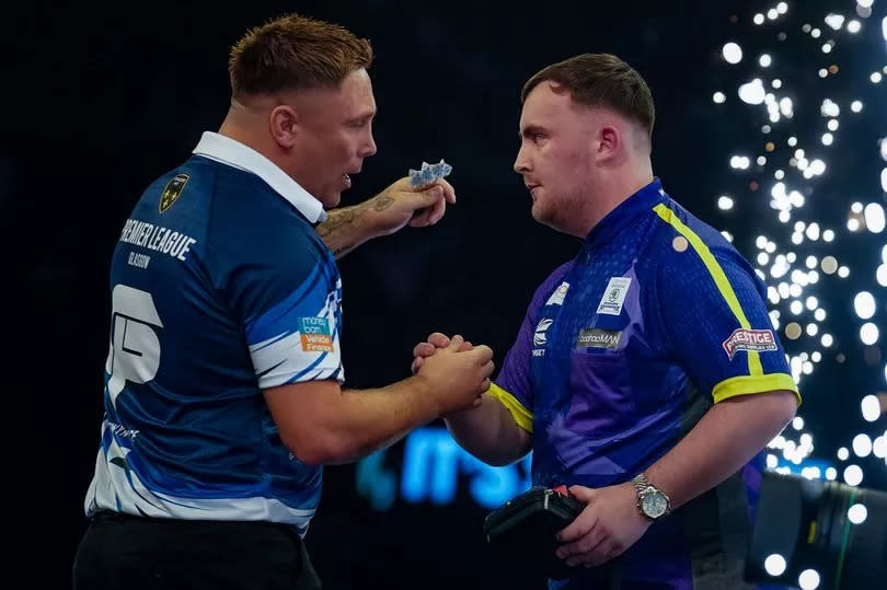 Gerwyn Price and Luke Littler shake hands