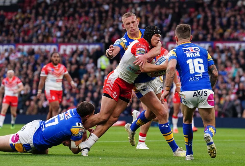 Jonny Lomax led from the front as St Helens sunk Leeds Rhinos (Martin Rickett/PA) (PA Wire)