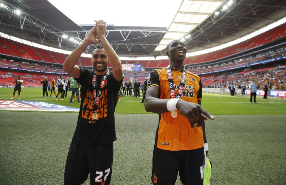 Britain Soccer Football - Hull City v Sheffield Wednesday - Sky Bet Football League Championship Play-Off Final - Wembley Stadium - 28/5/16 Hull City's Ahmed Elmohamady and Mohamed Diame celebrate winning promotion back to the Premier League Action Images via Reuters / Andrew Couldridge Livepic EDITORIAL USE ONLY. No use with unauthorized audio, video, data, fixture lists, club/league logos or "live" services. Online in-match use limited to 45 images, no video emulation. No use in betting, games or single club/league/player publications. Please contact your account representative for further details.