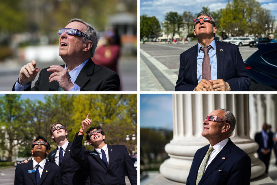 Senators and pages on Capitol Hill watch the solar eclipse on Monday. (Frank Thorp V / NBC News)