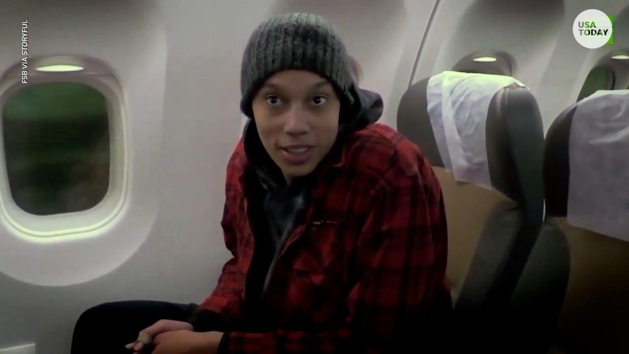 Brittney Griner appears apprehensively 'happy' during her release from Russian prison.