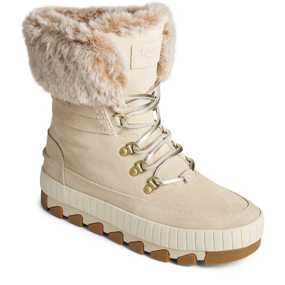 white and cream winter boot with fur lining