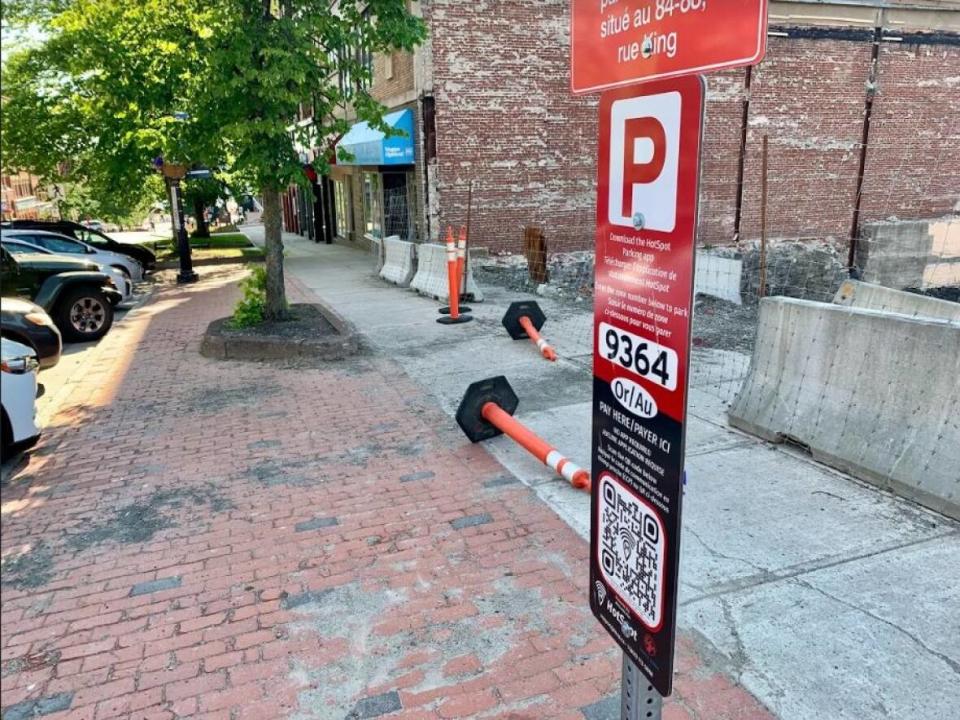 In March the city installed a sign with a QR code that users can scan with a smartphone. (Katie Hartai/CBC News  - image credit)